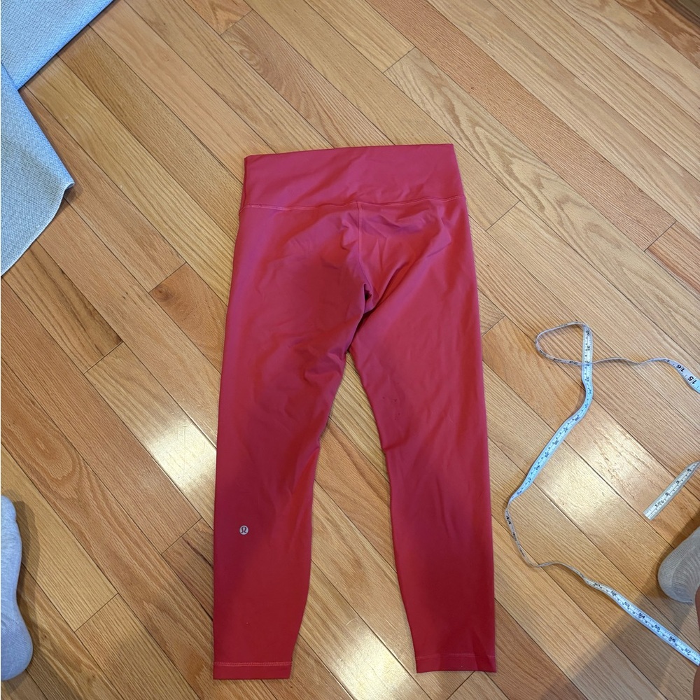 Lululemon Wunder Train tights in coral pink